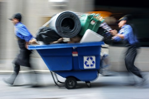 Team members efficiently clearing a loft space